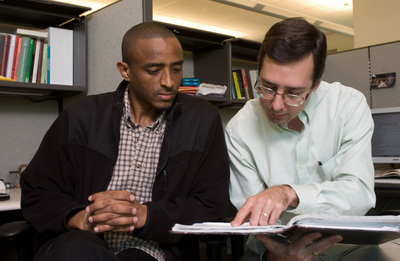 David and Berhane in M Offices